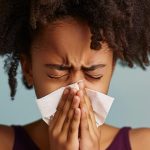 sick-kid-blowing-their-snot-into-tissue.jpg